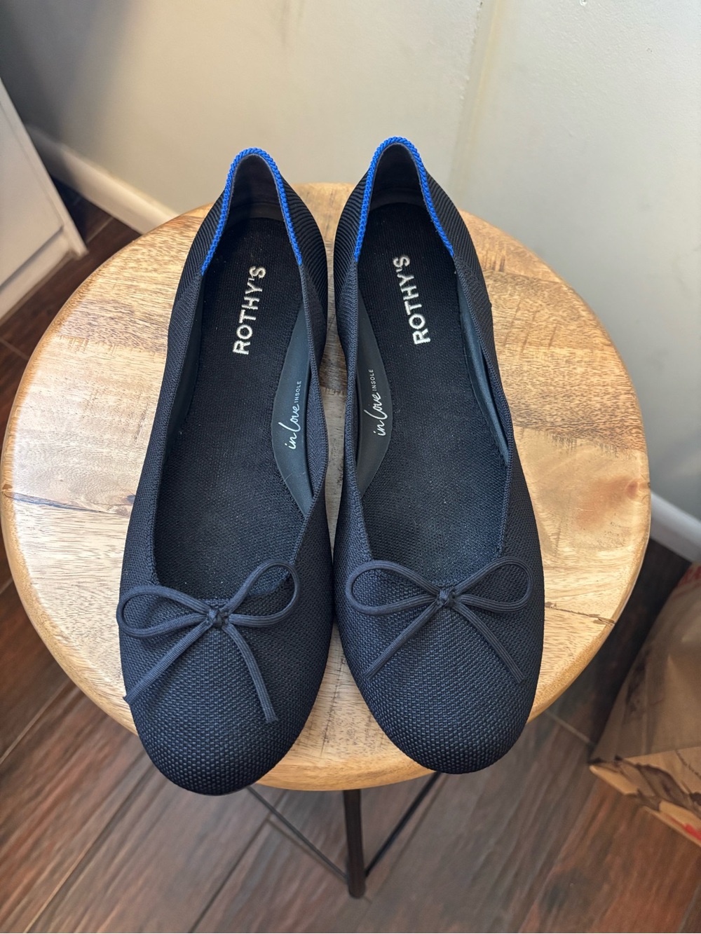 Rothy's Black Ballet Flats with Blue Trim and bow